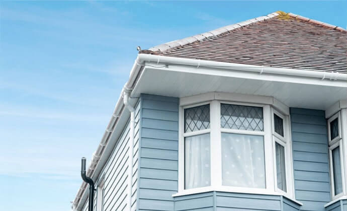 Blue Weatherboard Cladding on a House in Hook