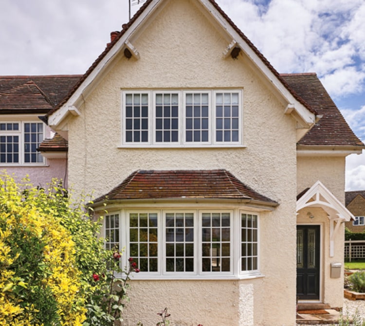 white flush windows on side of house