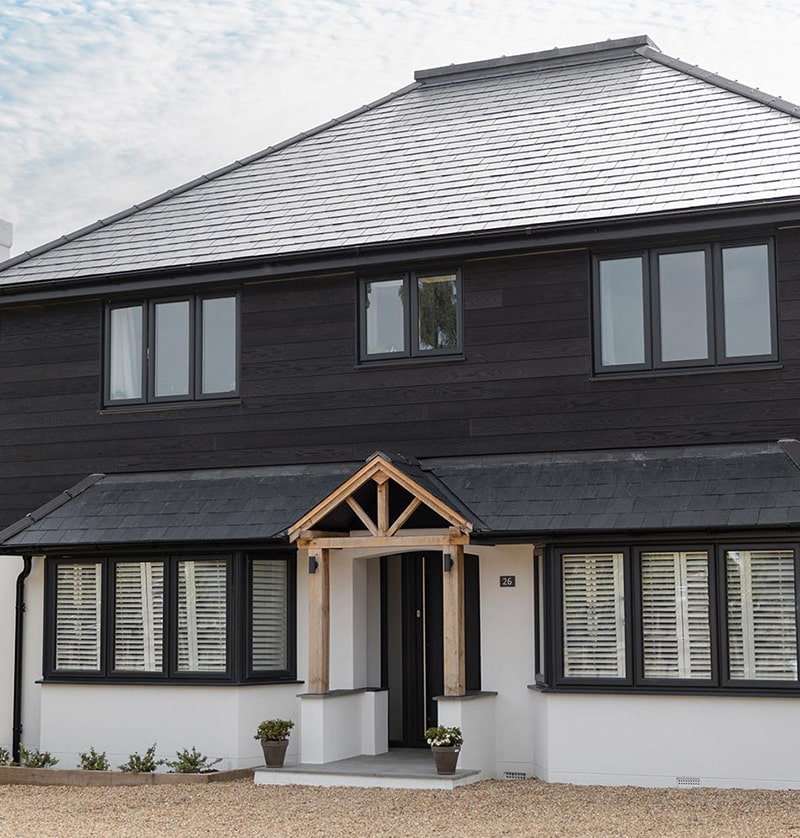 Burnt Umber Millboard cladding on home